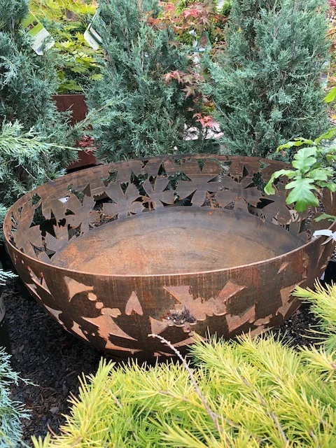 Rustic leaf pattern fire pit.jpg