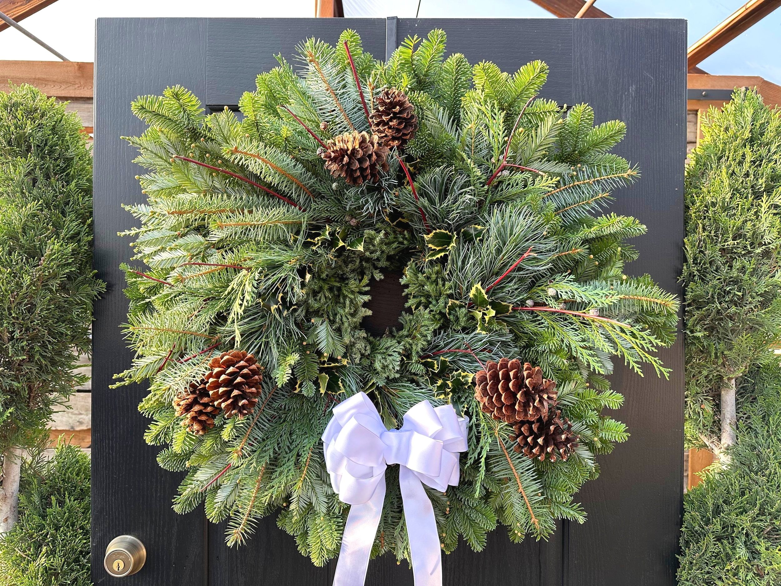 Wreath+%236+with+pinecones+%26+white+bow3.jpg