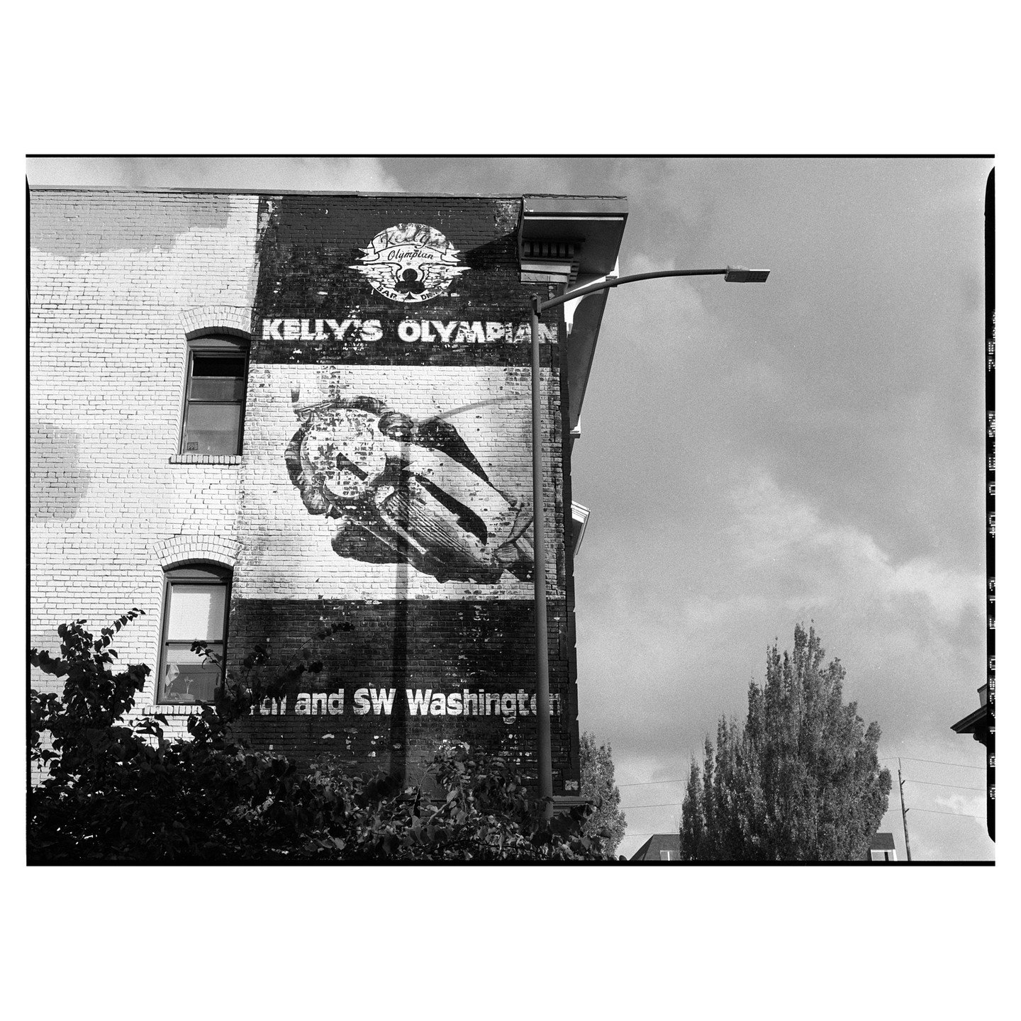 Walking up Burnside for no reason at all. 
.
#filmphotography #streetphotography #pdx #portland #blackandwhitefilm #cityscape #pentax645n #mediumformat #outandabout