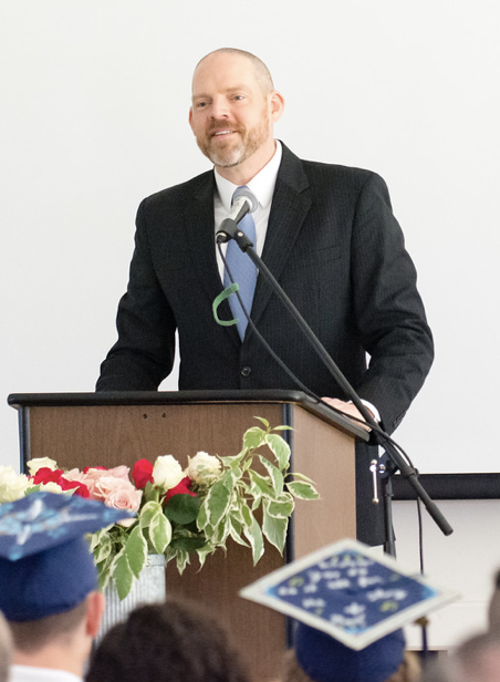 Director Chris Westrate addresses the class of ‘19