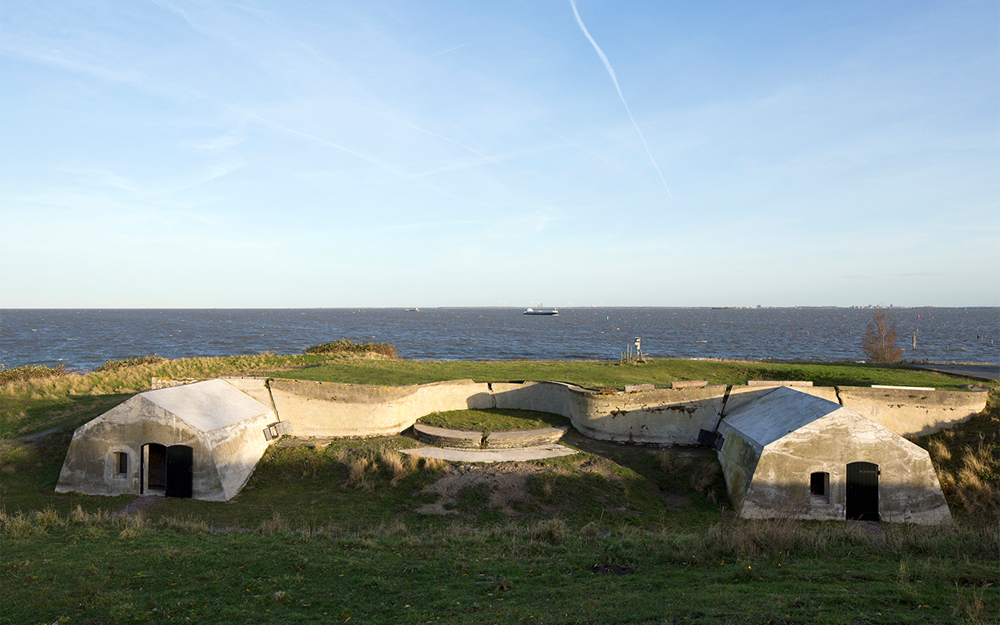 Open air theatre next to former ammunition bunkers that where transformed into small refuges where people can spend the night