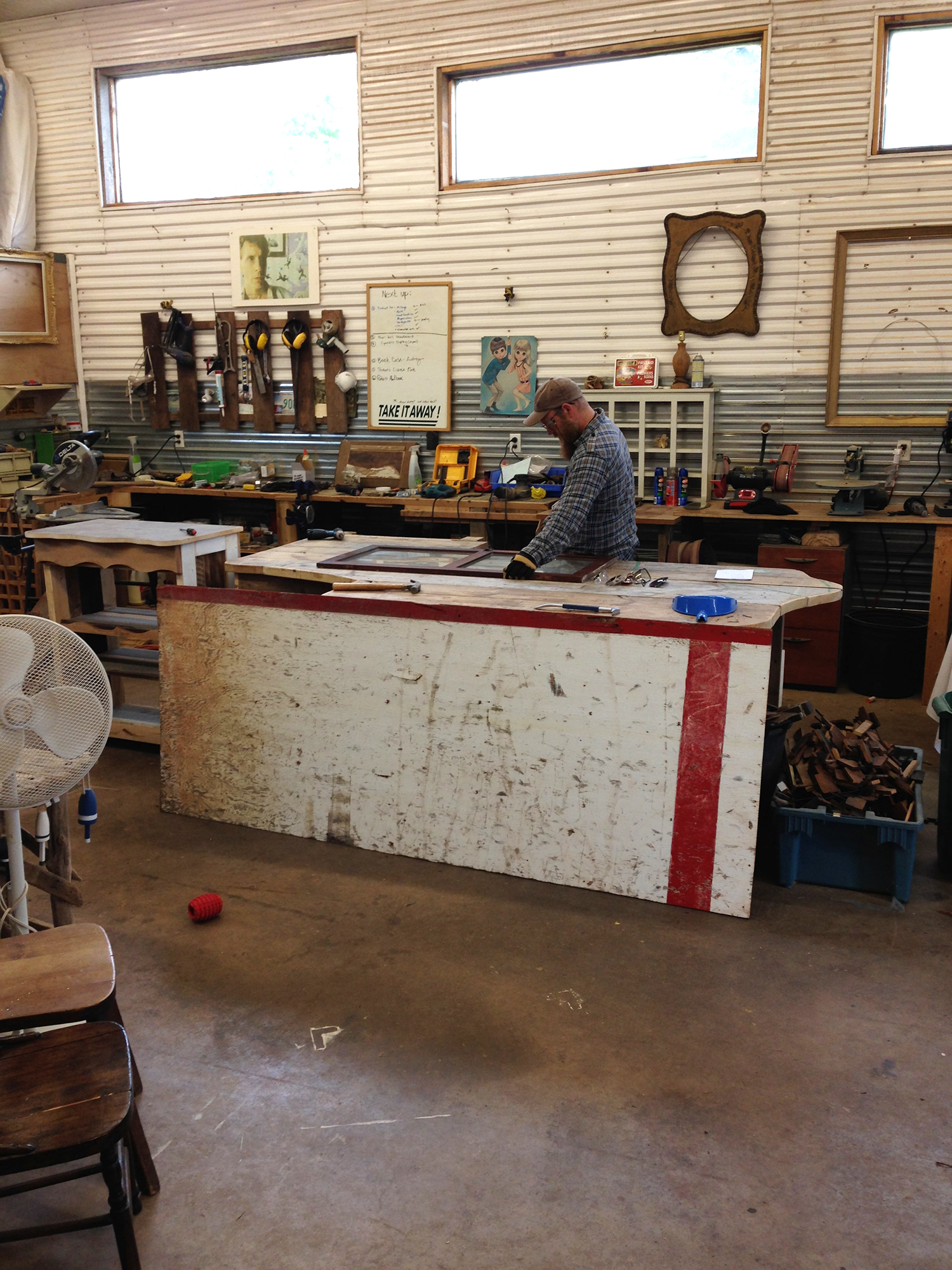 The backing for the display case: hockey rink board