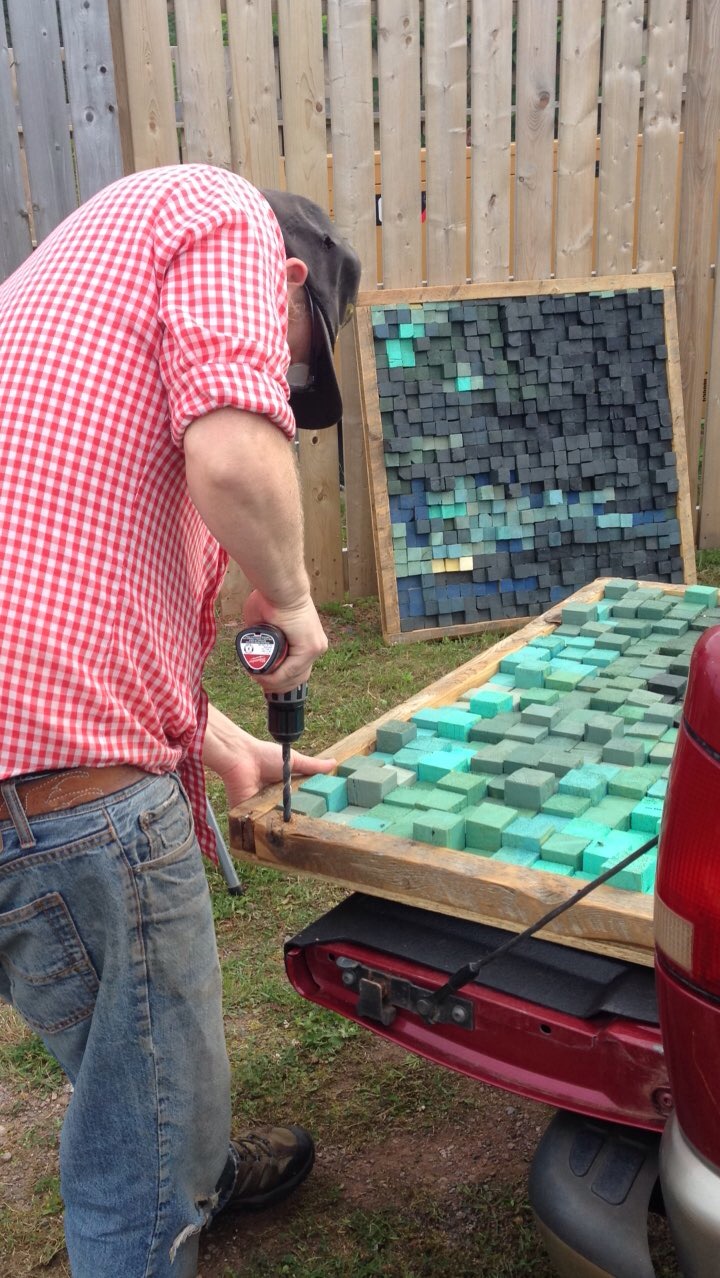 Lenny drilling bolt holes.