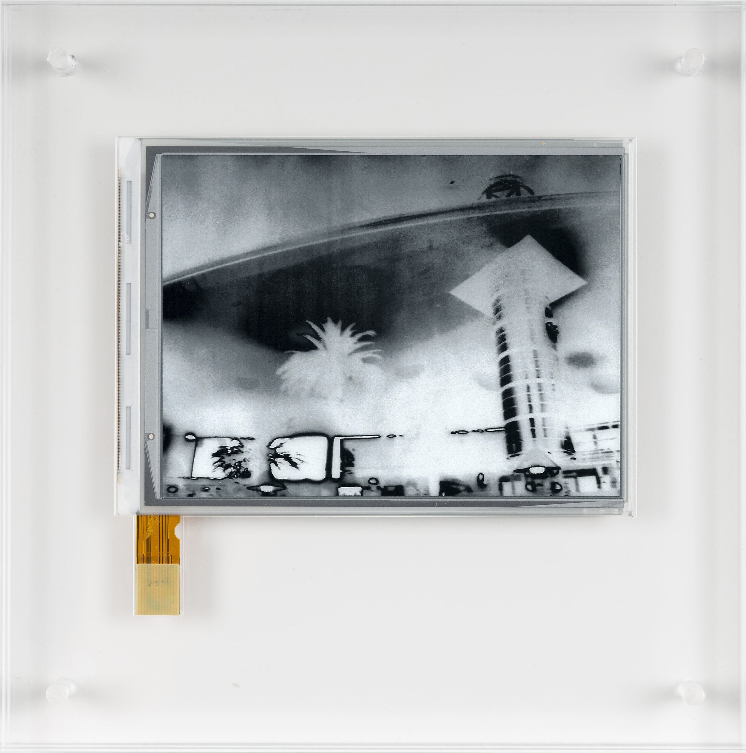 E.I. LA-LV_57 2016  E-ink screen encapsulated in Perspex box.  Negative Date 2015 10.1cm x 12.9cm - 20 x 20 x 3.2cm with frame  Unique .jpg