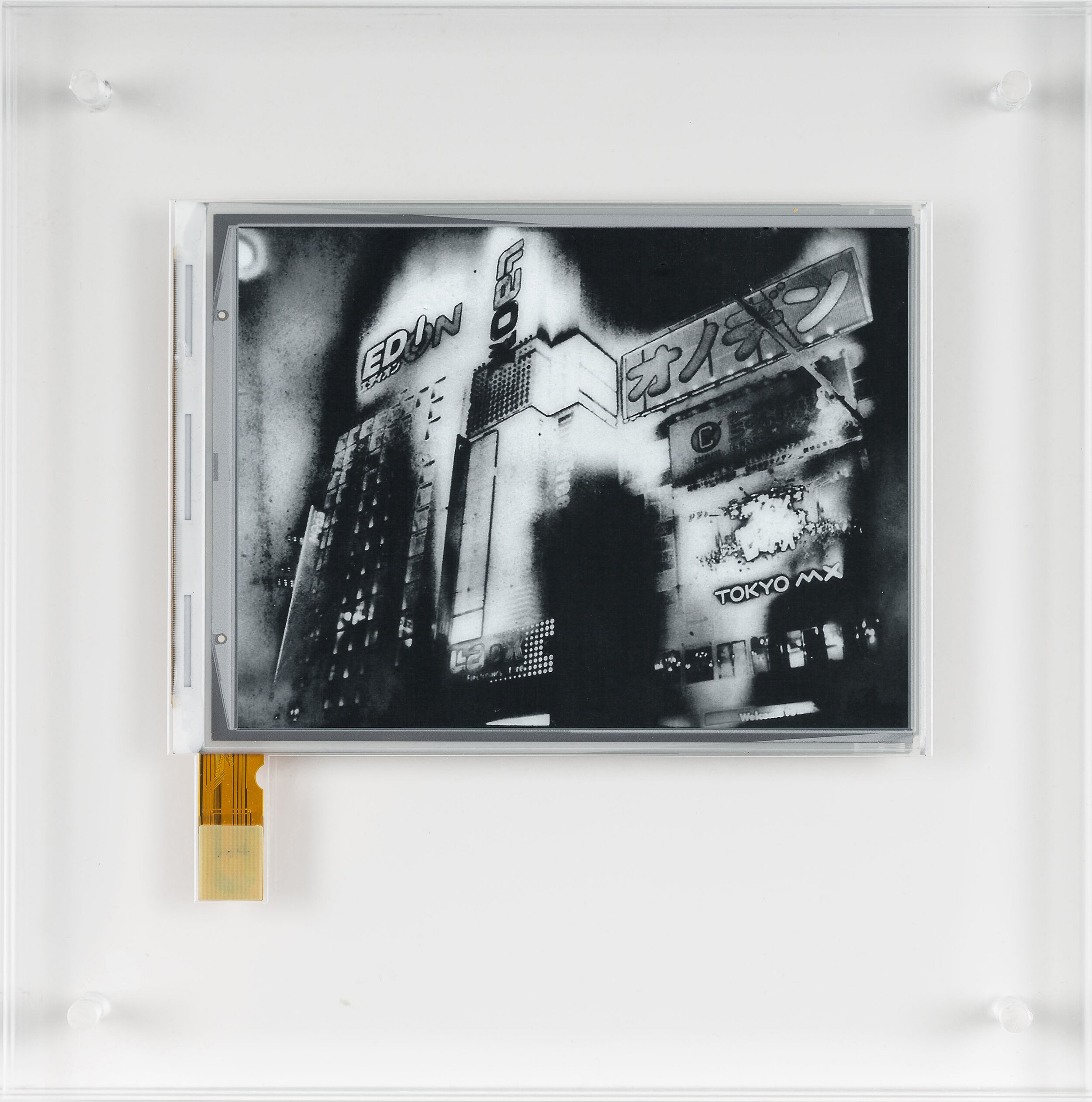 Antony Cairns_E.I. TYO4_048 2021  E-ink screen encapsulated in Perspex box.  Negative Date 2019  10.1cm x 12.9cm - 20 x 20 x 3.2cm with frame  Unique .jpg