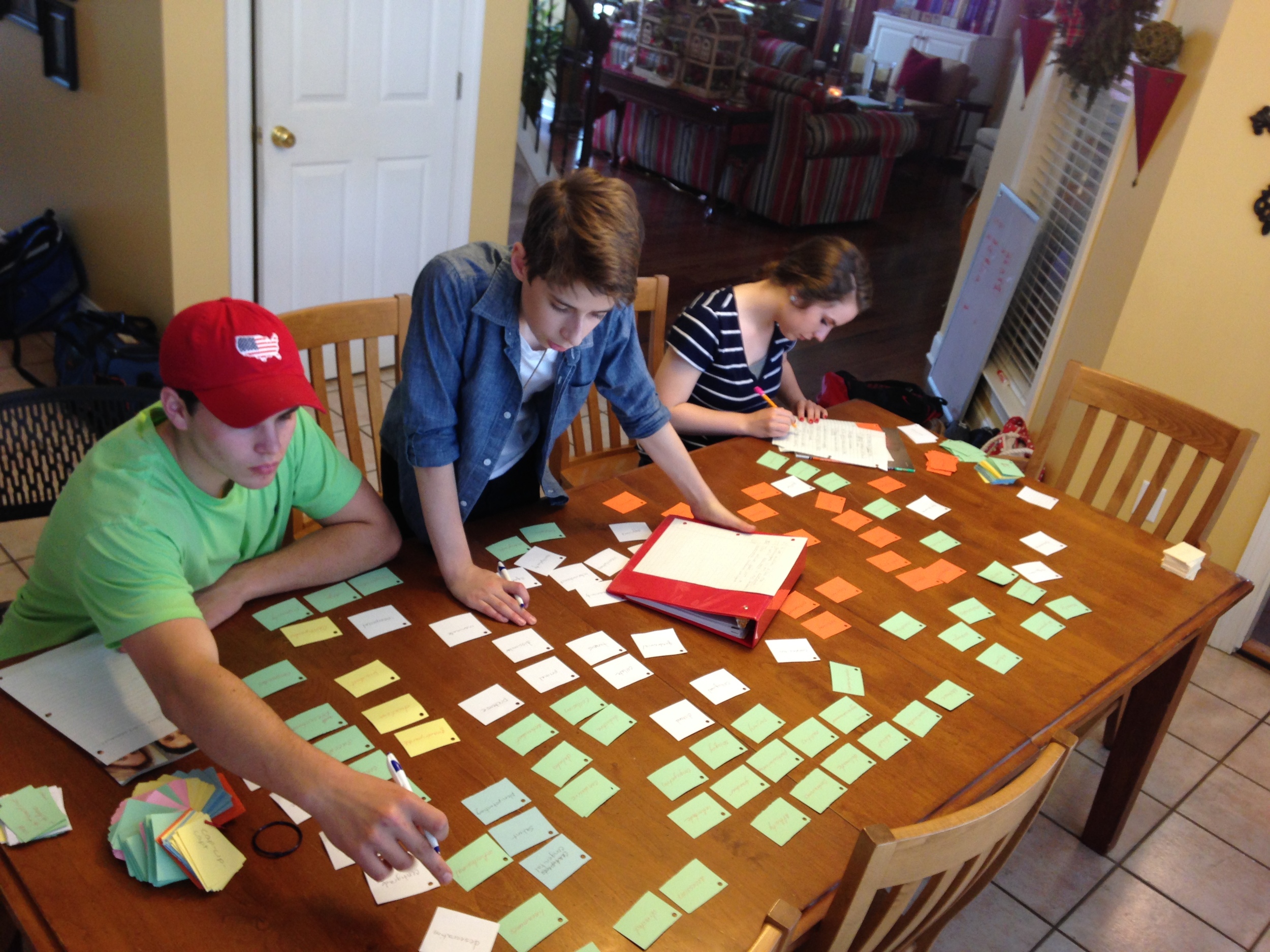 Word Grab! Making sentences with our etymology cards from the semester.
