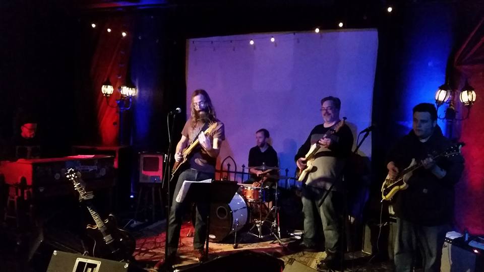 Yada Yada Blues Band featuring Milky Burgess, guitar and vocals; Anthony Estrada, guitar and vocals; Johnny Horn, electric bass; Ron Weinstein, hammond organ.
