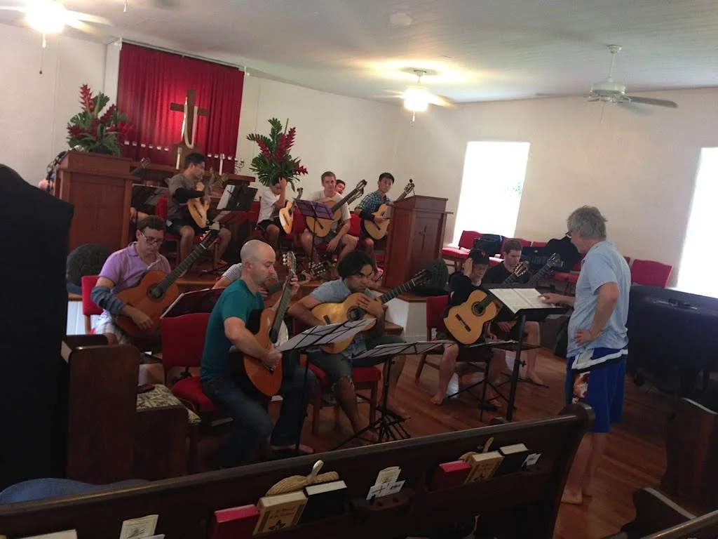 John Dearman rehearsing the guitar orchestra at Keawala'i Church, Makena (2014)