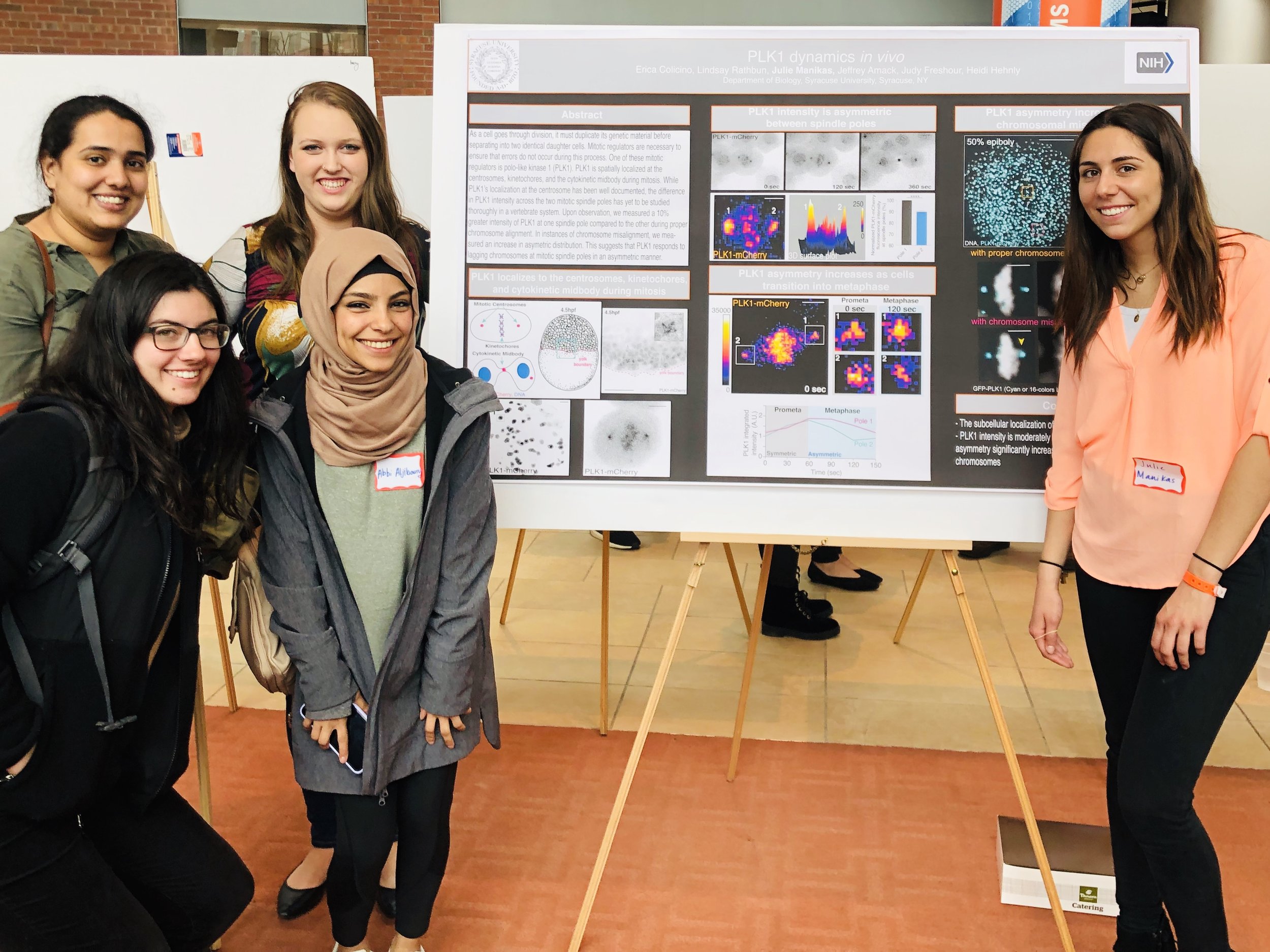 Shown are Nikhila, Erin, Jess, and Abrar at Julie’s poster!