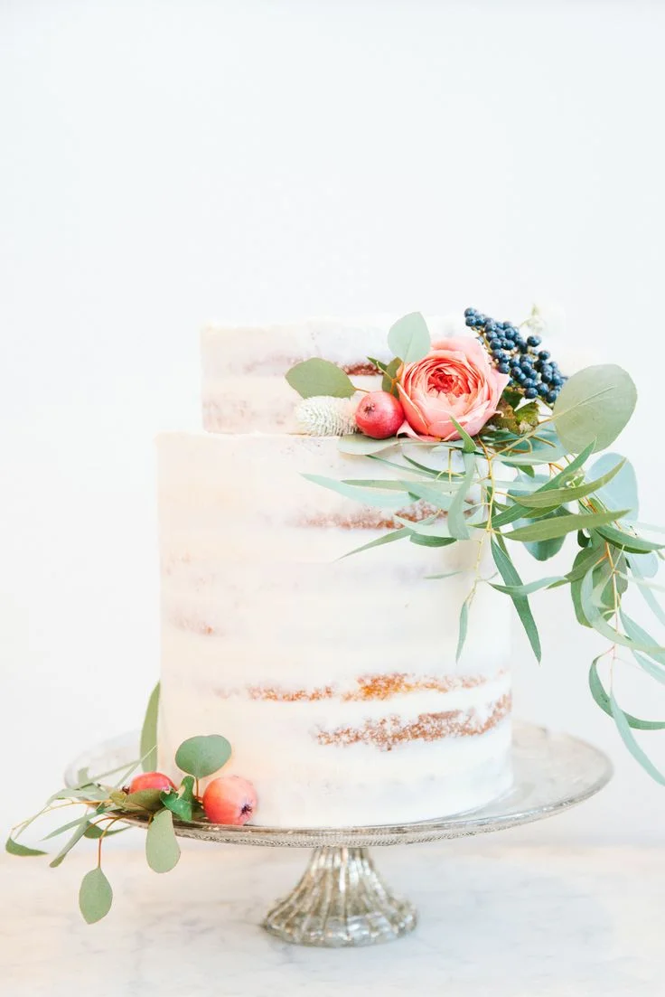 Mercina- elegant, understated, enchanting Amaretto Cake with Pear Preserves and Champagne Buttercream ( source )