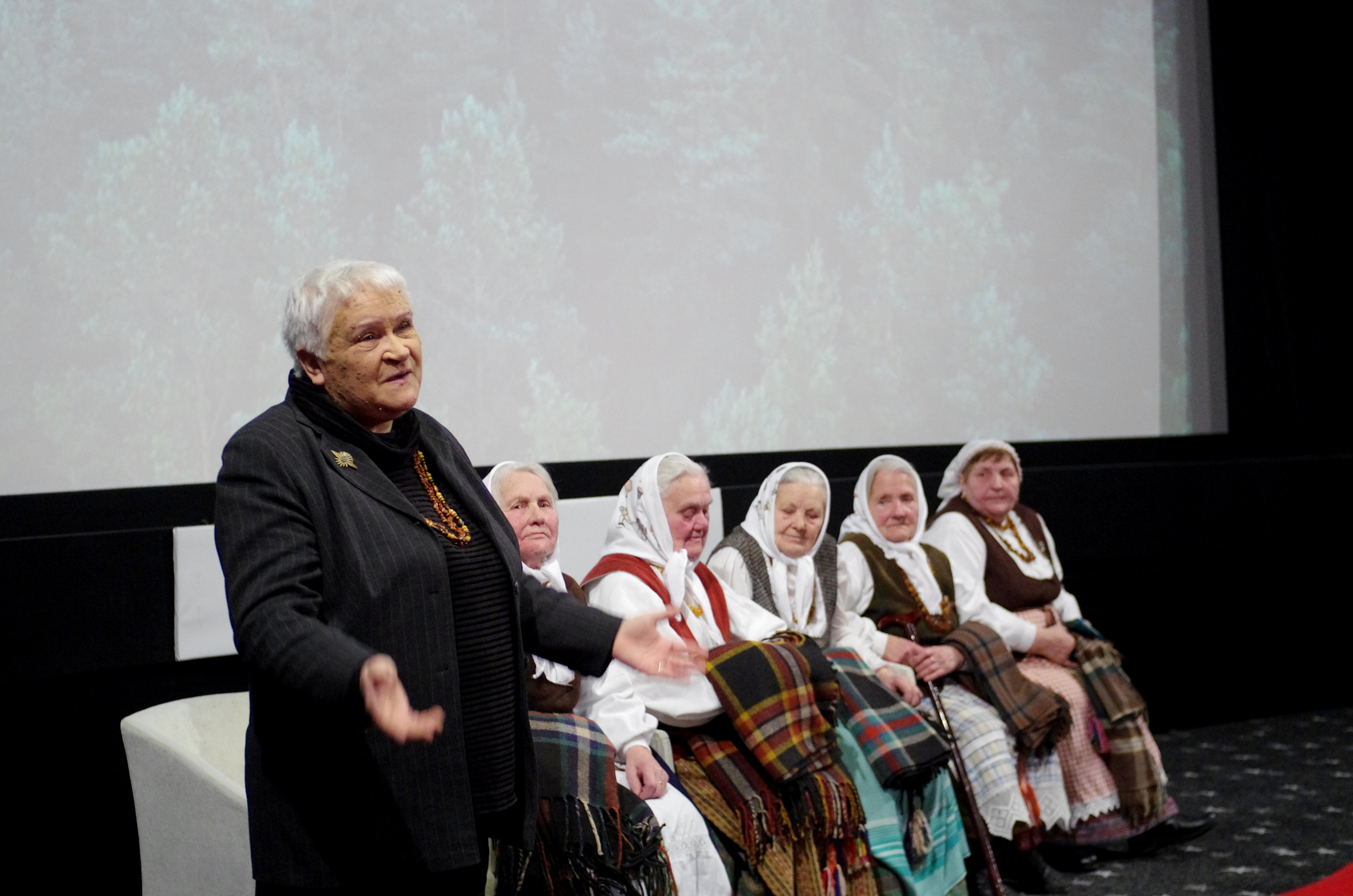  World Premiere at the Vilnius International Film Festival in Vilnius, Lithuania (March 2015). Acclaimed singer and music historian Veronika Povilionienė and the grandmothers perform before the screening. 