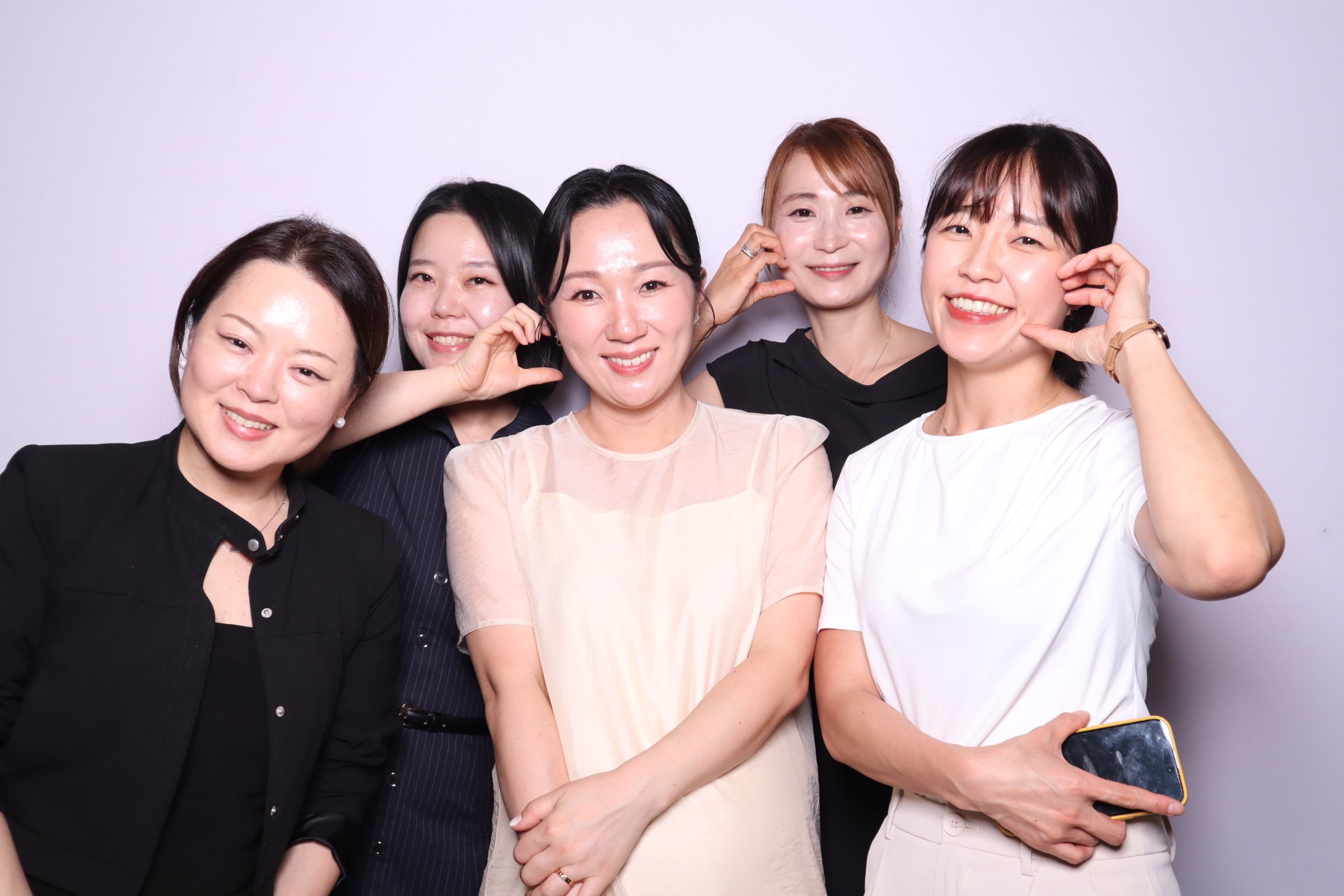 Min & Sang Waterview wedding photobooth special snaps white backdrop
