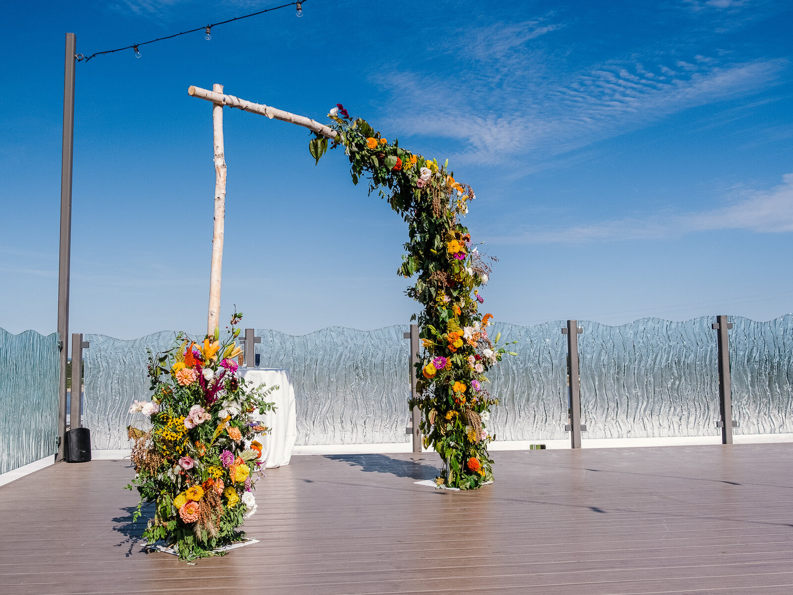 Wedding Ceremony Arch covered in wildflowers from Urban Buds in St. Louis, Missouri