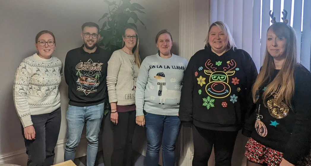 The L.E.A.D. IT Services team with their Christmas jumpers.