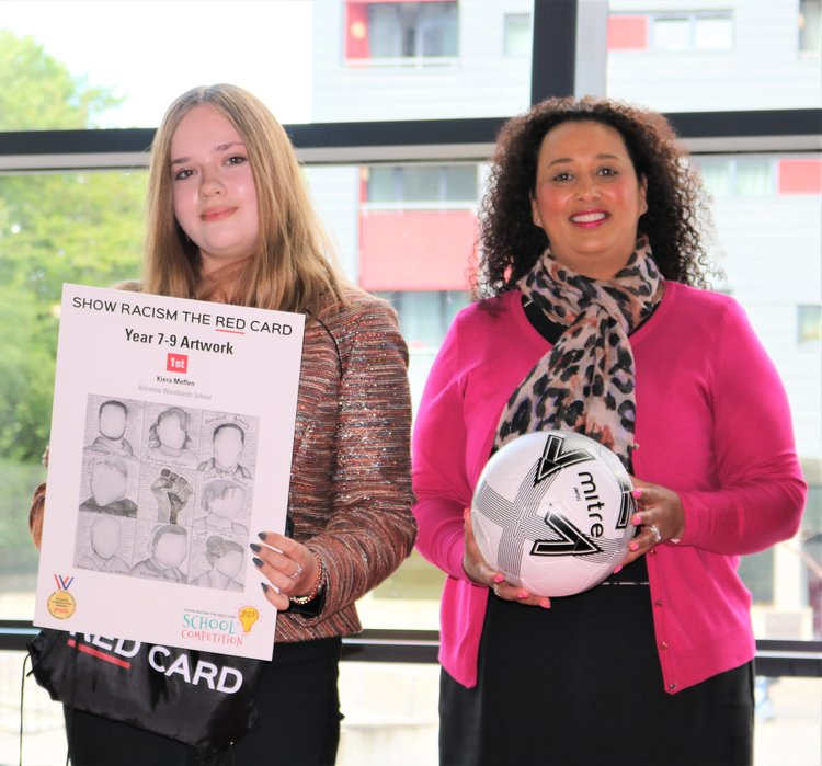 Kiera with her winning artwork