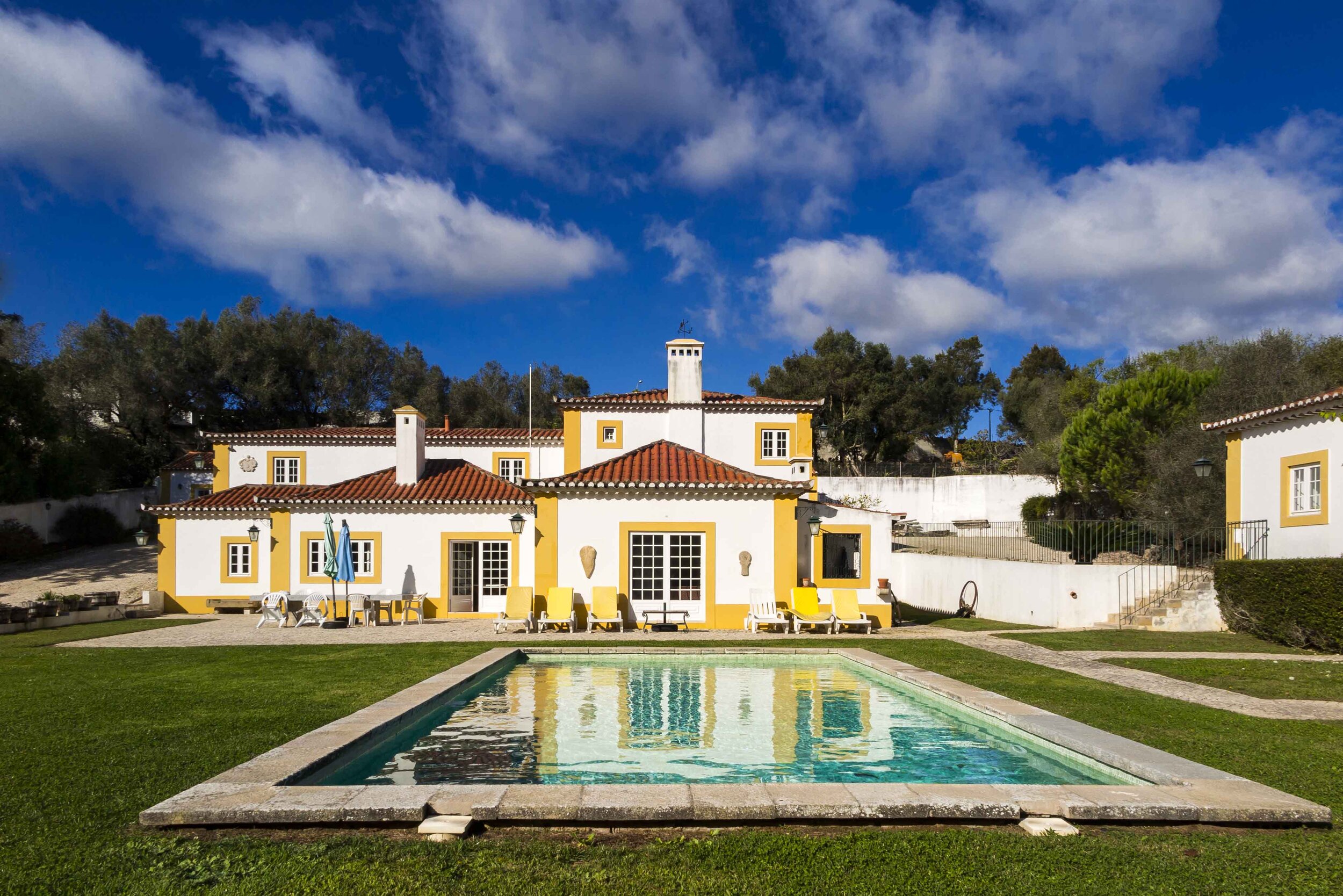 A typical country house is set in lush gardens boasting citrus trees, aromatic herbs, vibrant hydrangeas and blushing bougainvillea. The outdoor swimming pool includes a spacious sun terrace and dining area, as well as a open air barbecue