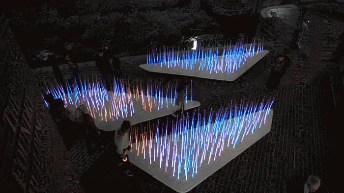 Visitors playing with and exploring the reactive environment.
