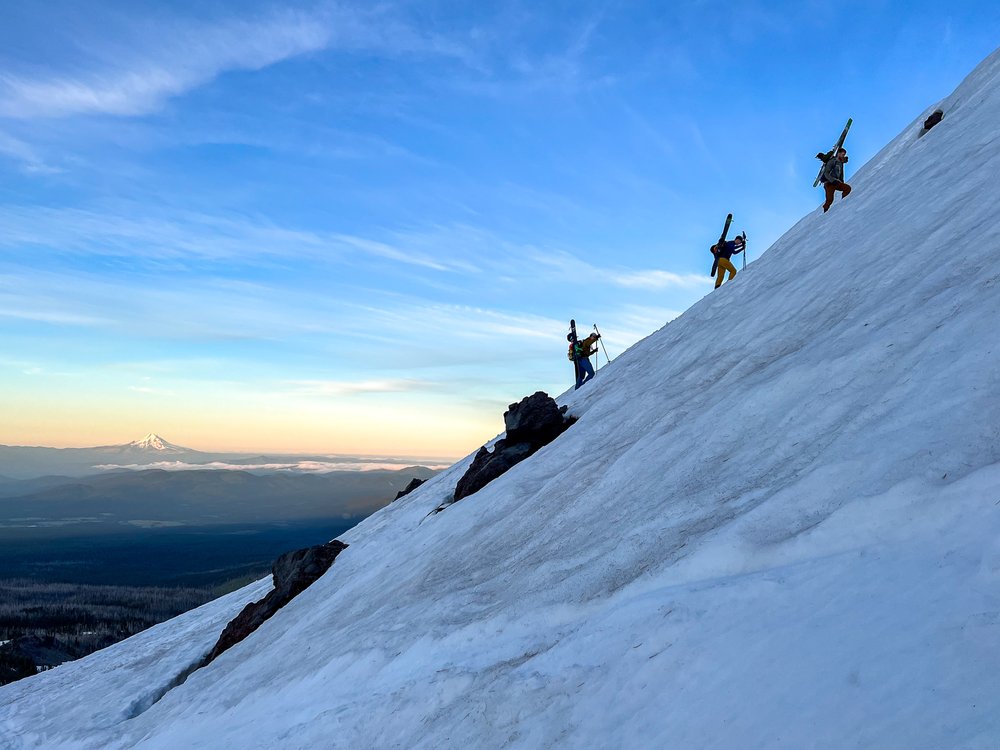 Skiers making their way up Mt Adams