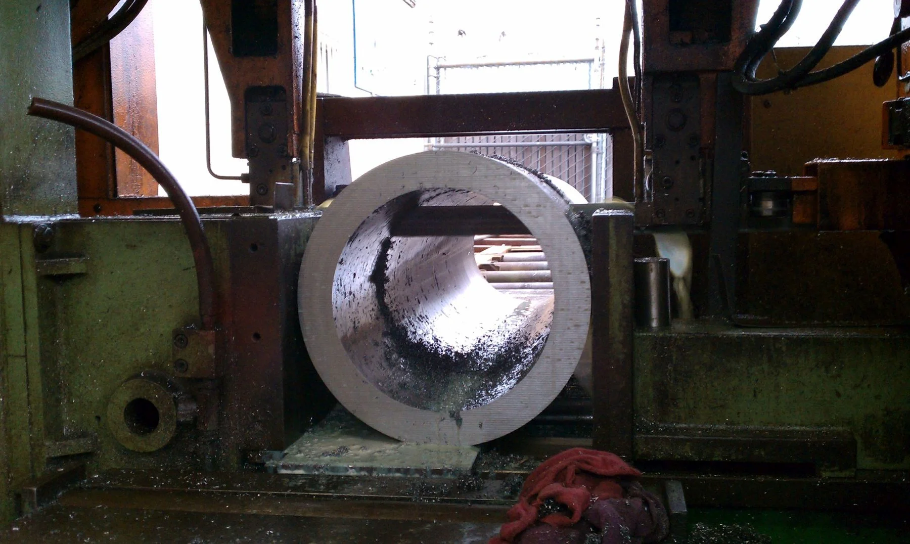 Saw cutting 14" OD, trepanned bar