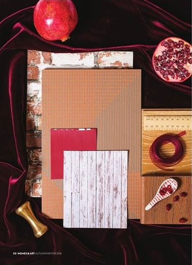 Burgundy is big! Think deep moody velvets with accents of gold detail, grounded by exposed brick wall and earthy elements.