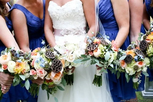 blue bridesmaid dresses and sash.jpg