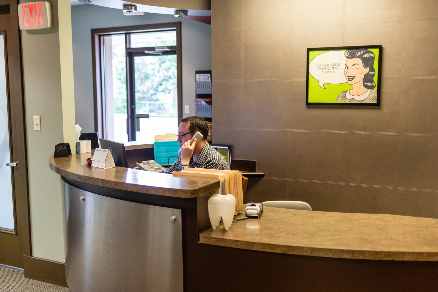 Jamie greets clients, sets appointments and takes care of payments.