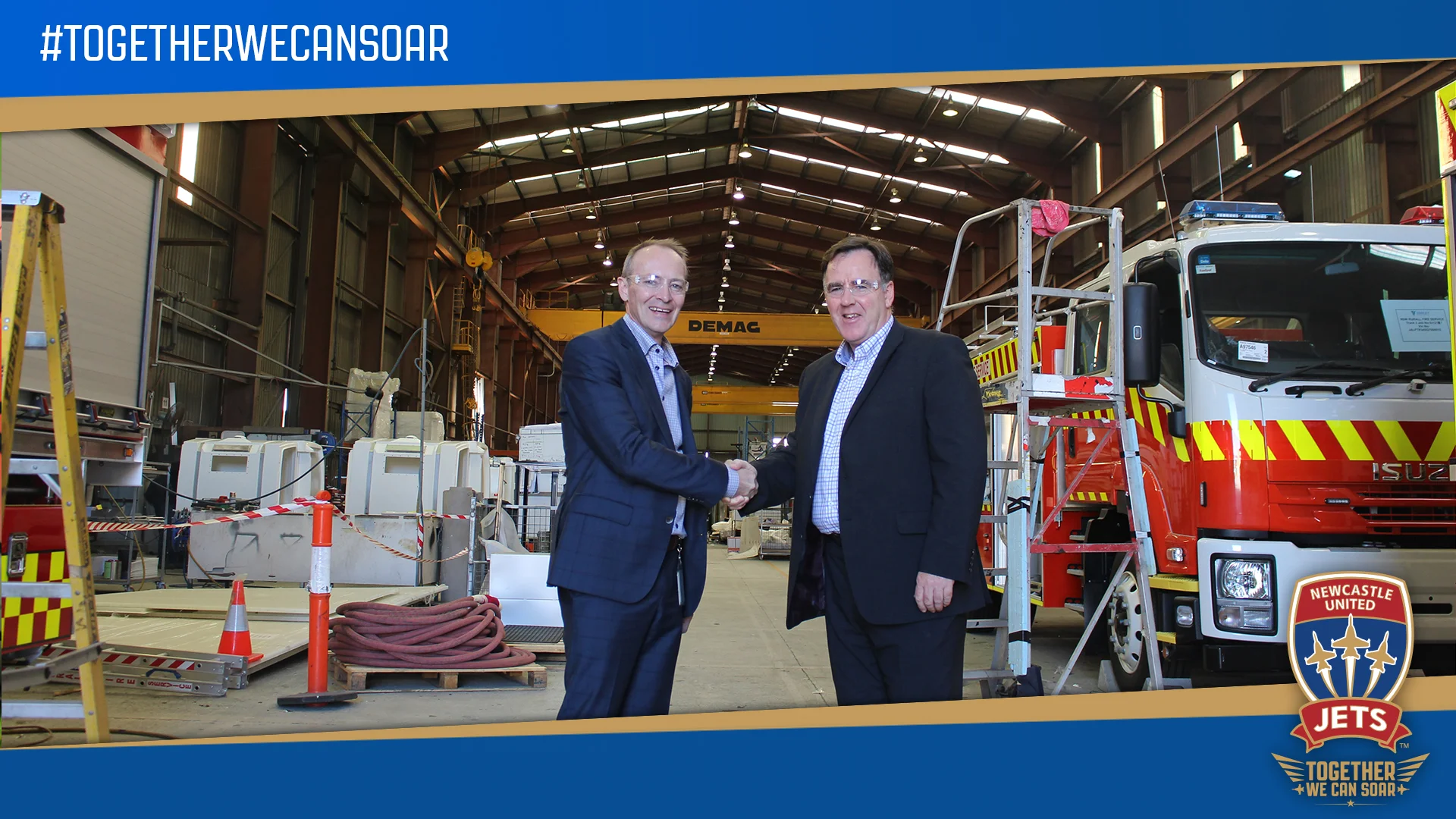 Varley Group MD, Jeff Phillips, with Newcastle Jets CEO, Lawrie McKinna, at Varley's Tomago facility this week.