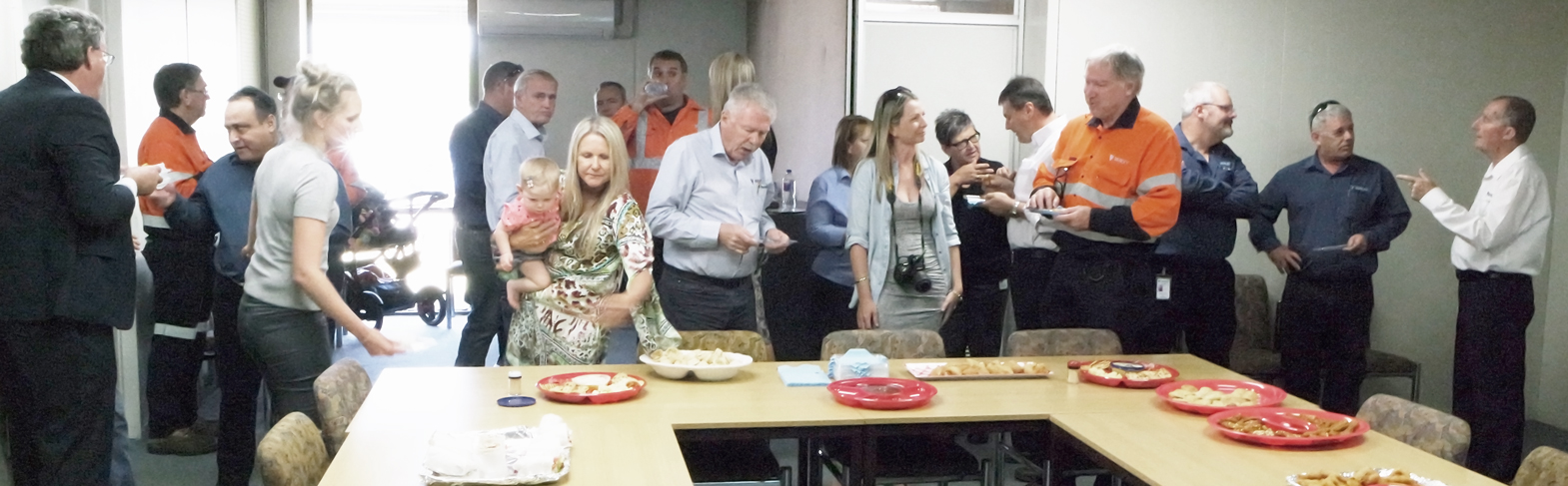 Dave (far right) surrounded by friends and family at today's presentation ceremony.