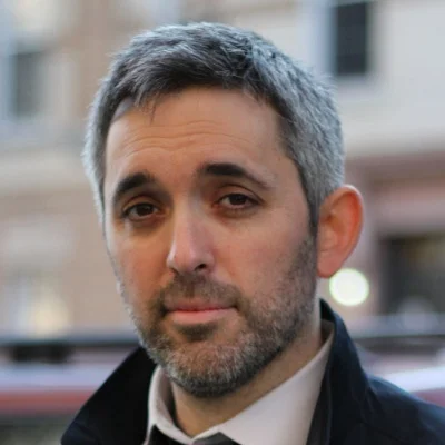 David Rynn was a public defender and prosecutor before he dropped it all and moved to NYC to pursue the arts, film and the lucrative business of improv. Now, as a bazillionaire, he spends his time between lounging at his mansions and collecting gold plated replicas of leer jets flown by famous people.