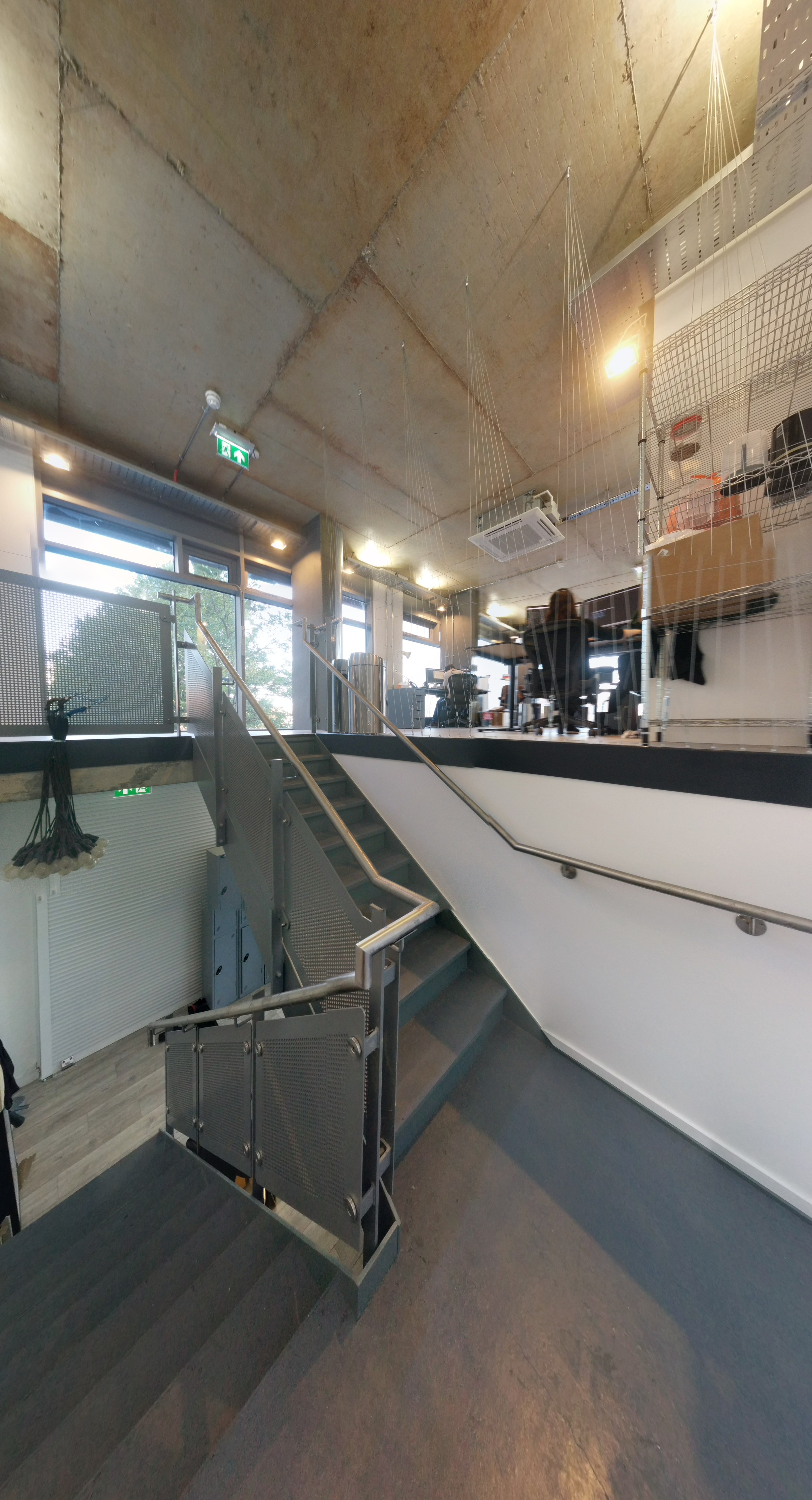 Stairs to the first floor in our new offices. Our 60 bulb lamp has been rescued from the old place. 