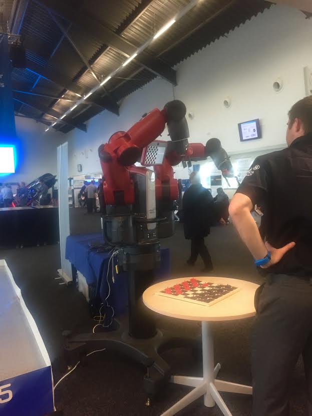 Laura Did battle with a huge Drafts playing Robot at the Mathworks Matlab Expo. It won not because it never sleeps, and never, ever, ever, stops until it's crushed you, but because the kids these days don't know how to play drafts.