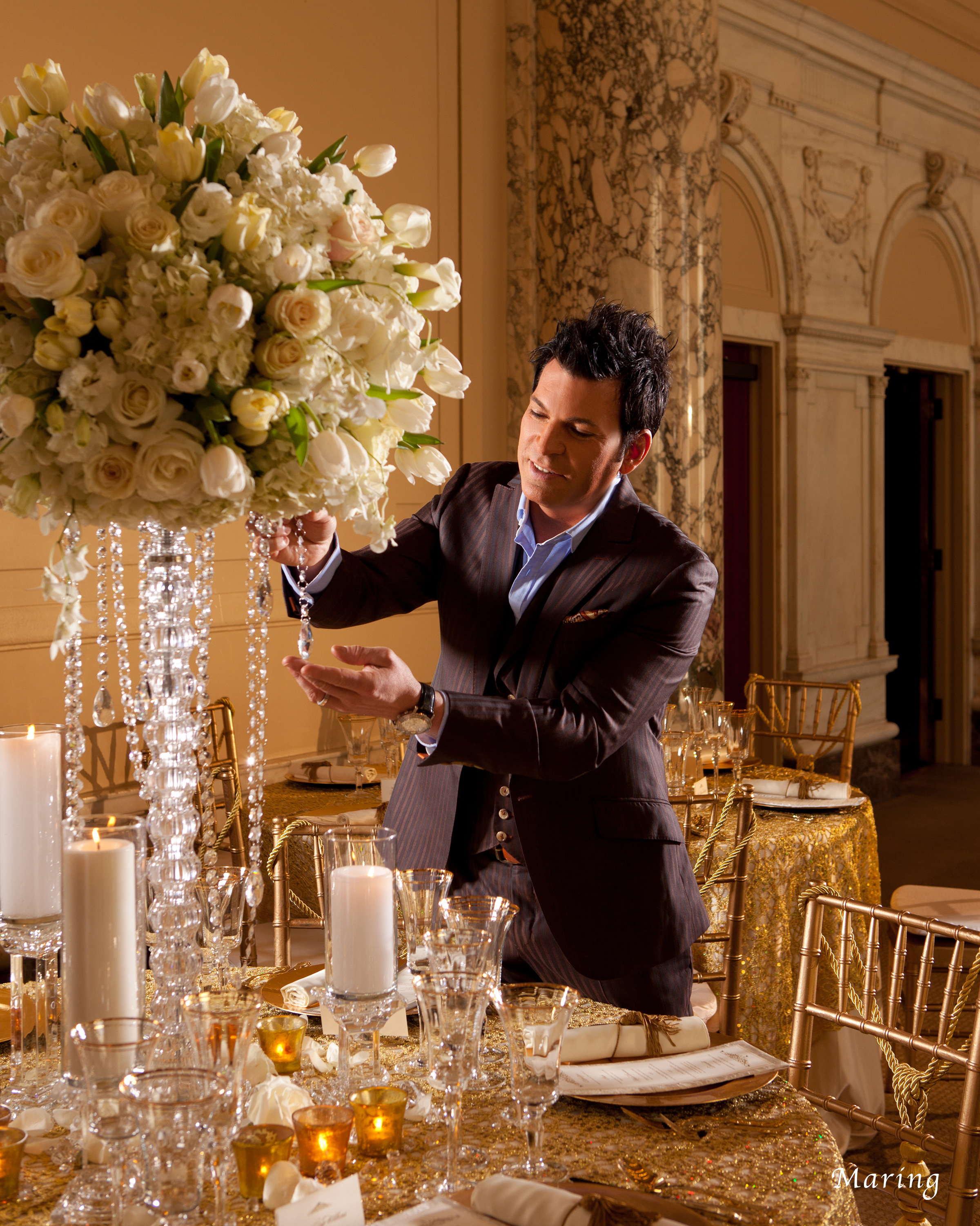 David Tutera putting the finishing touches on a gorgeous design - photo by MARING VISUALS
