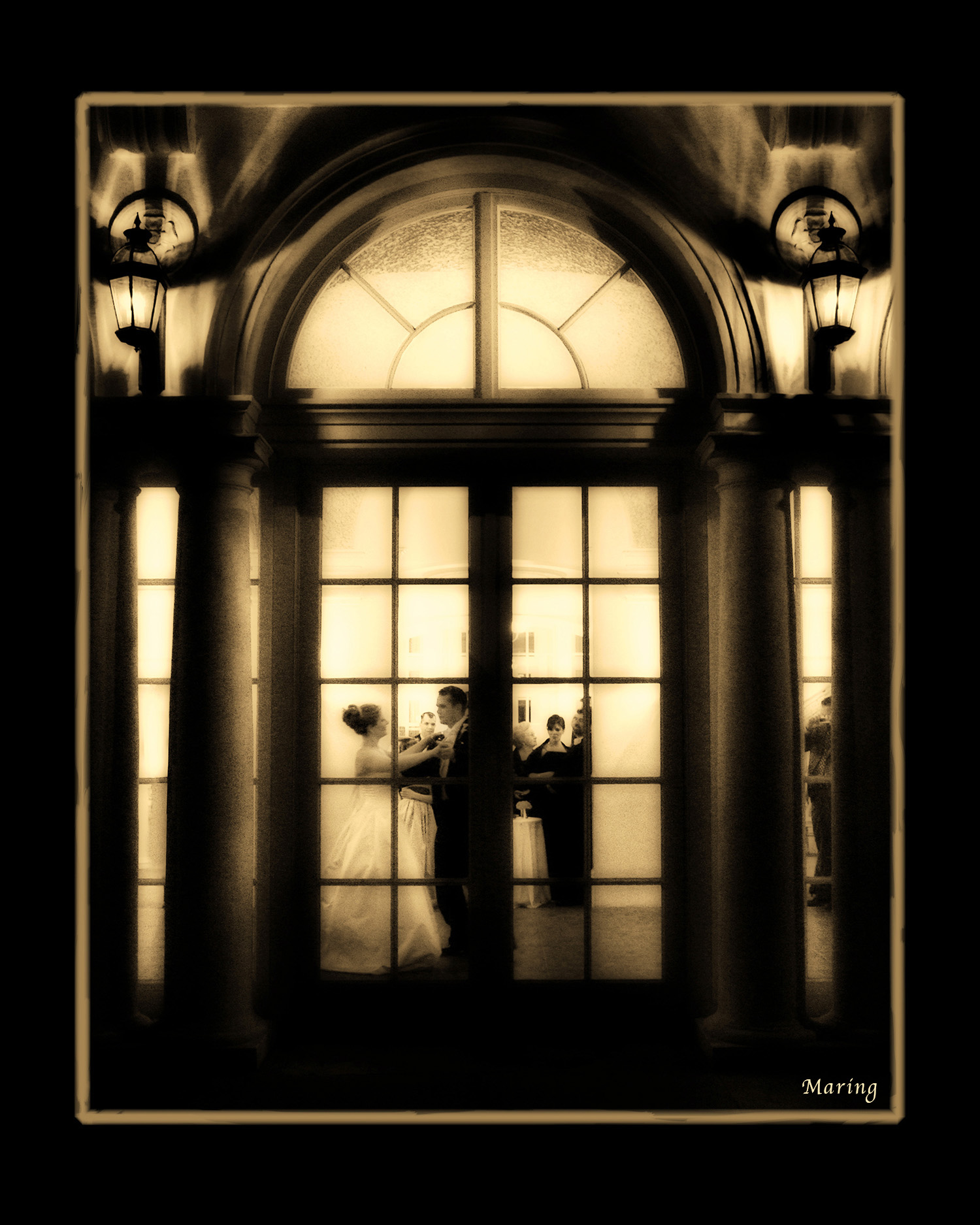 Architecture and creative lines make real moments even stronger. Photographer Charles Maring stood in the rain waiting for this moment to perfectly align during the bride and groom's first dance. Wedding at Wadsworth Mansion in Connecticut.
