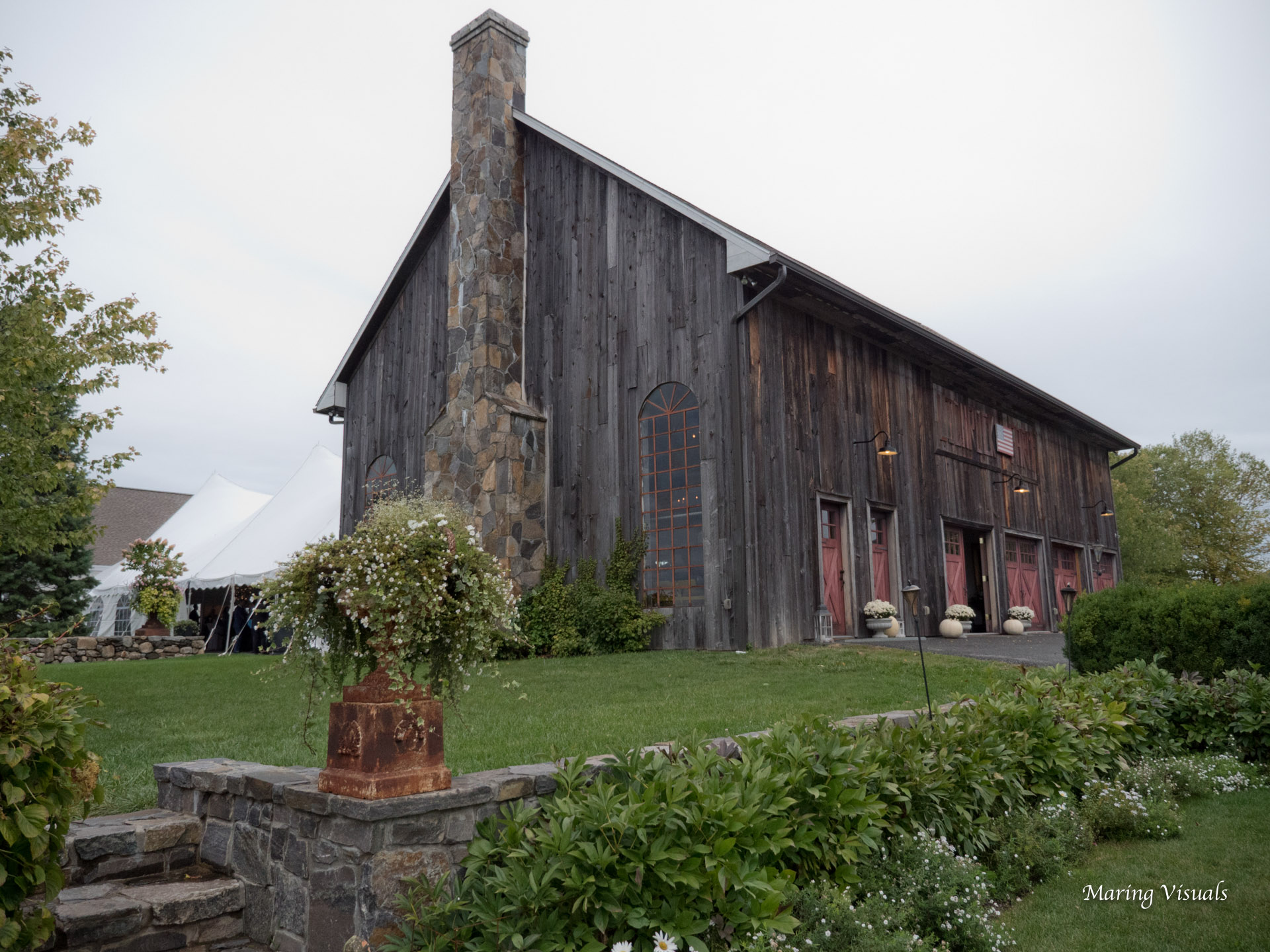Entrance to the cocktail reception both in the barn and in the tent located behind