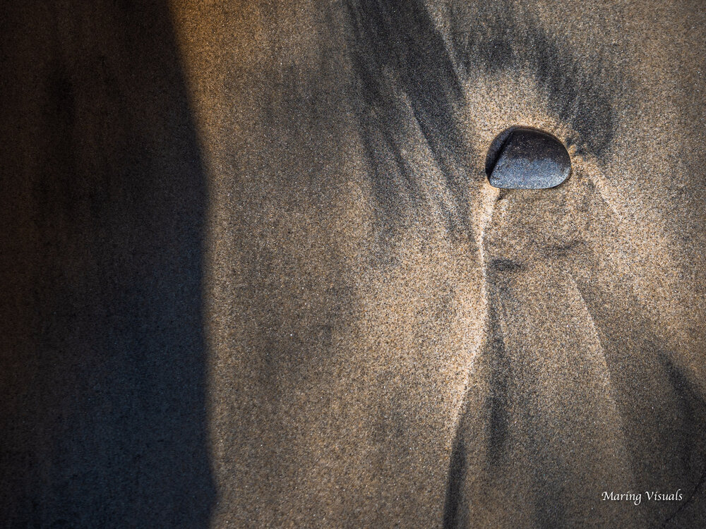 Faces in the Sand