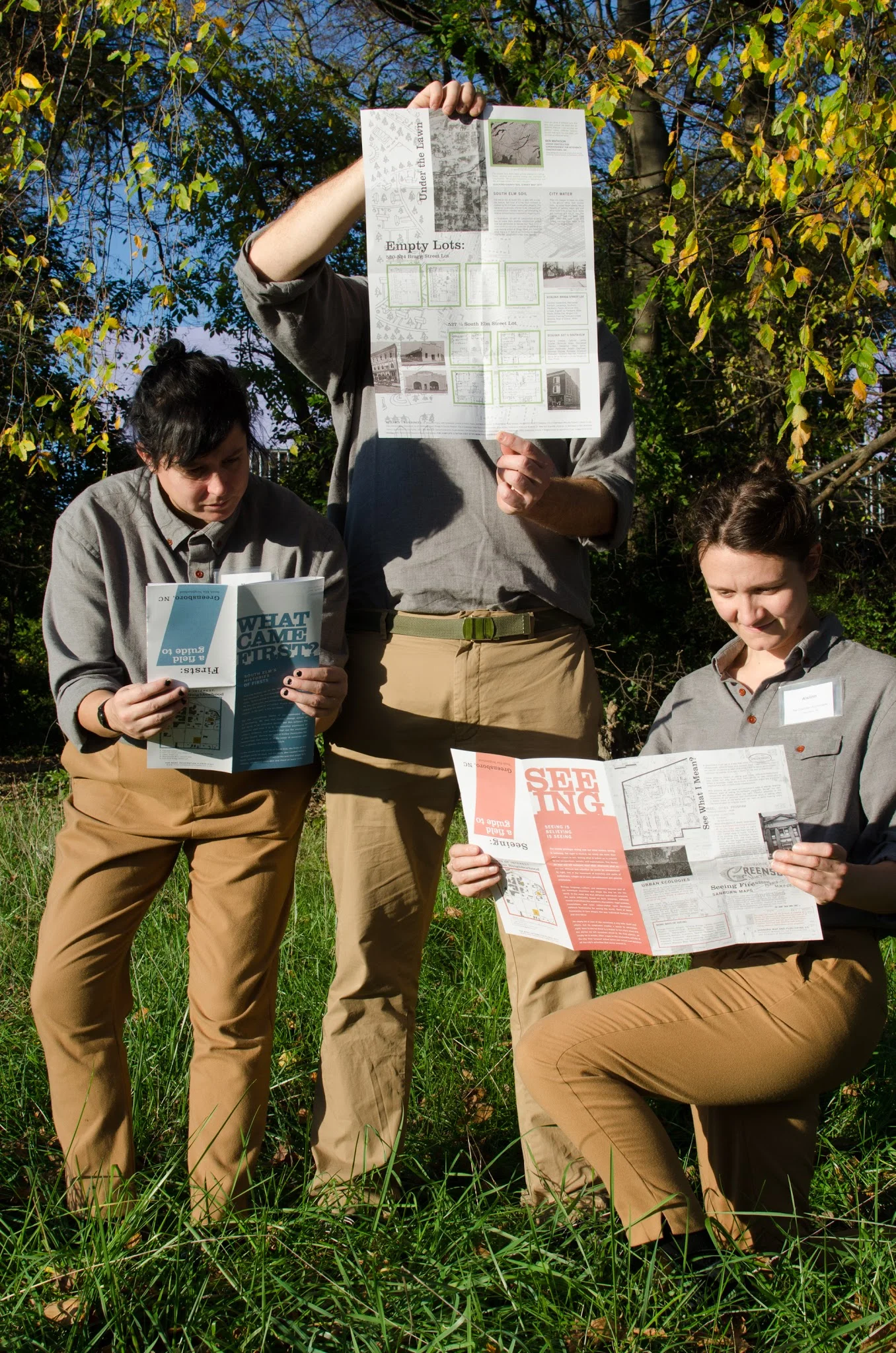 Camp Little Hope as The Chamber of Commons with their neighborhood field guides for Elsewhere's 2015 Curatorial Initiative, South Elm Projects. Photo courtesy of Elsewhere.