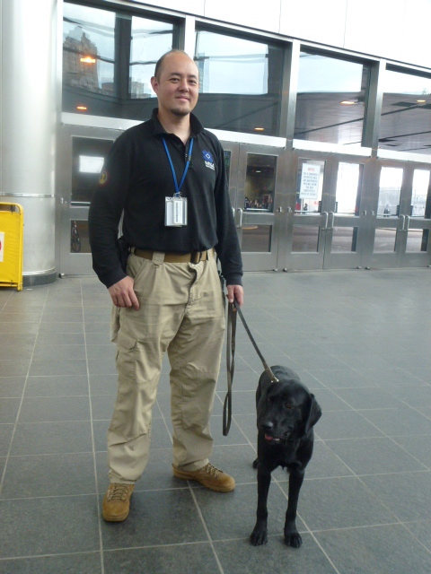  Bomb sniffing dog and handler at the Staten Island Ferry. 
