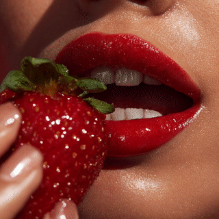 msastre_HD_macro_shot_of_a_person_with_red_lipstick_biting_in_bb20086d-14d1-461f-ba40-f528c5afa34b_0.gif