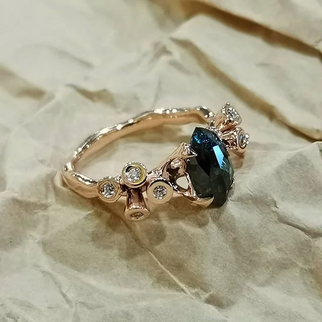 #rosegold #ring with #moissanite and blue #saltandpepperdiamond

One of my random designs which I had brought to life. 😁

Yes, it is for sale so DM me for pricing.

#ringsofinstagram #jewellery #hajewellery