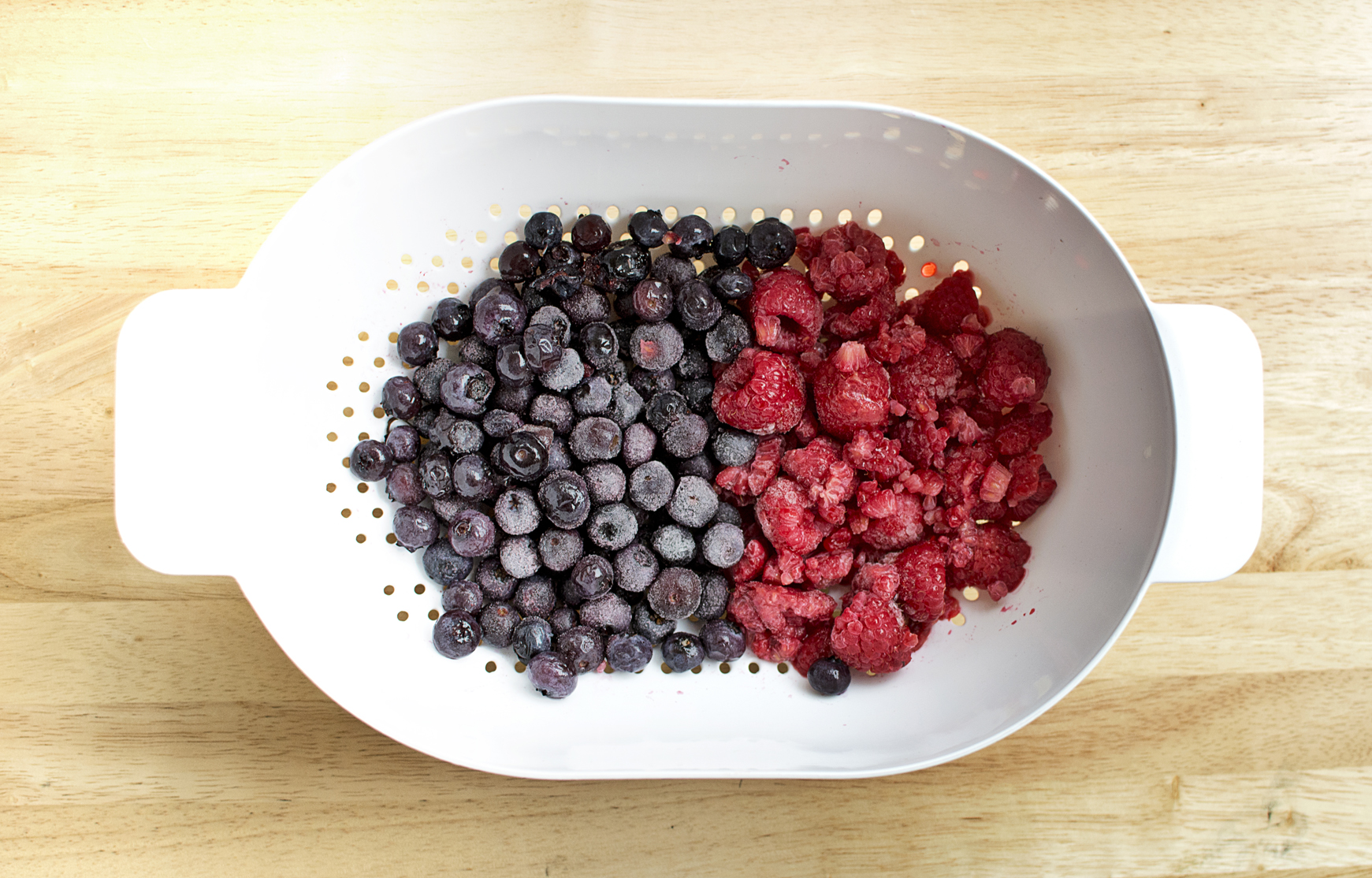 I like to buy local fruit when it's around and freeze it up to use throughout the year. That way I always know where my food came from. 