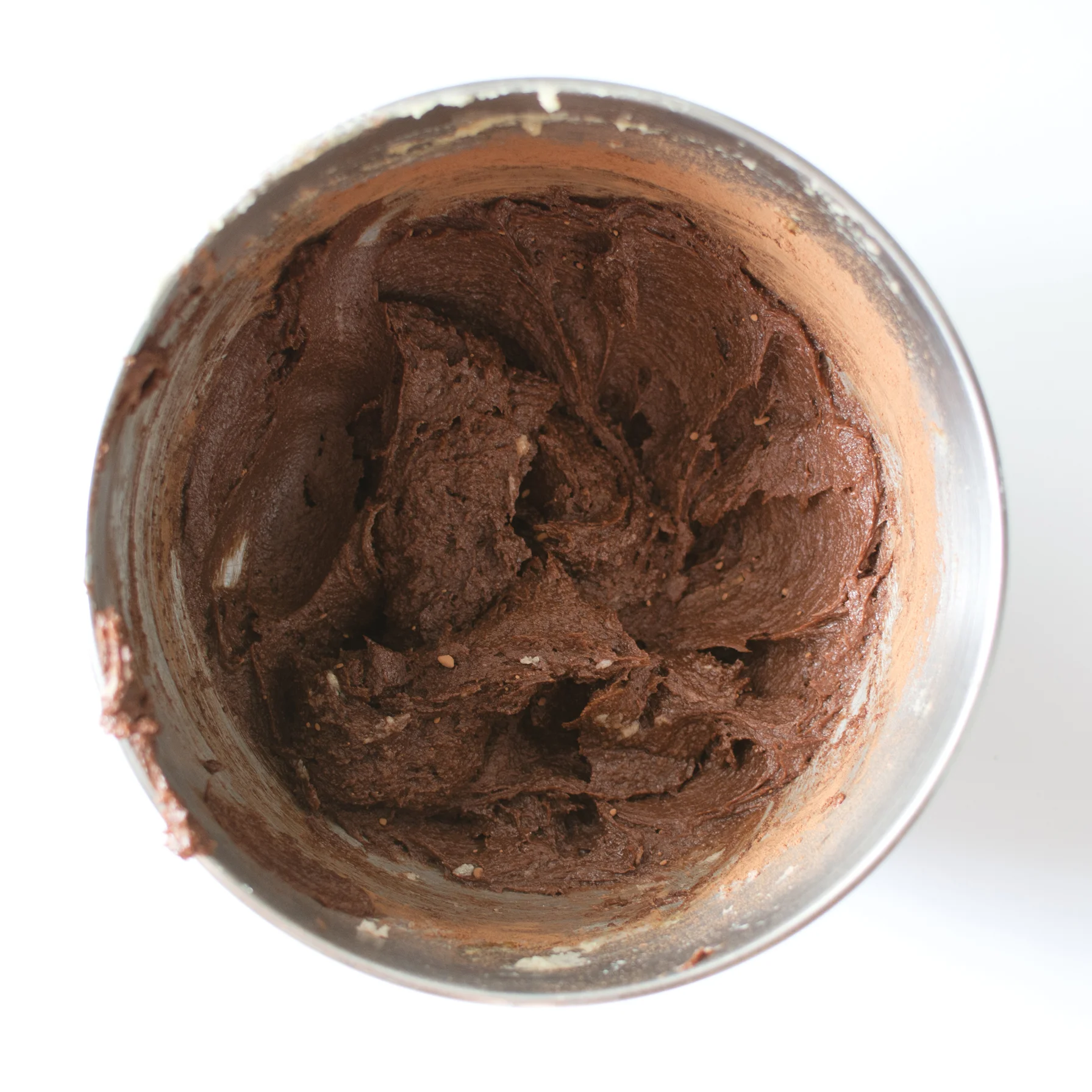 4. Add cocoa powder, flour, salt, and baking powder; mix on low until incorporated. 