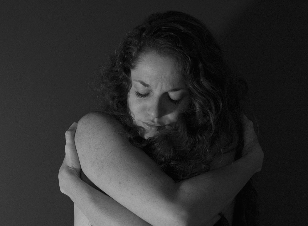 When I get especially down, I'll give myself a hug. It may sound silly, but damn does it feel good. Showing yourself love through touch can be just as if not more effective than positive self-talk. 