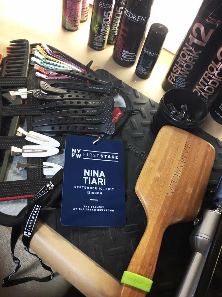 backstage set up with hair styling essentials 