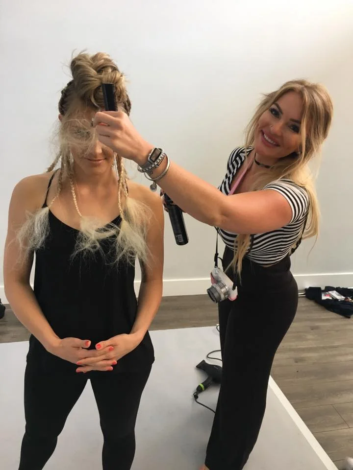 Nikki doing touch up on set