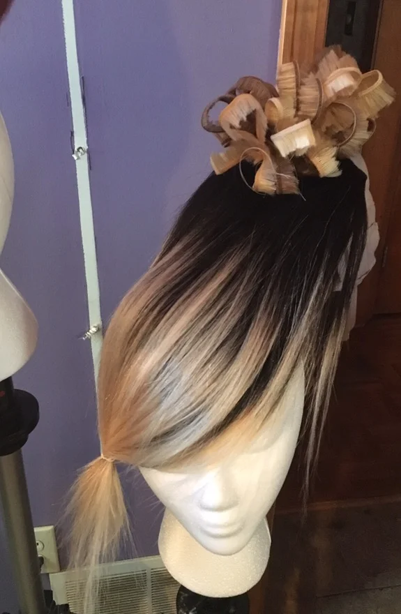 the blonde shape.... you can see were the top is made of the wefted piece from hair extensions
