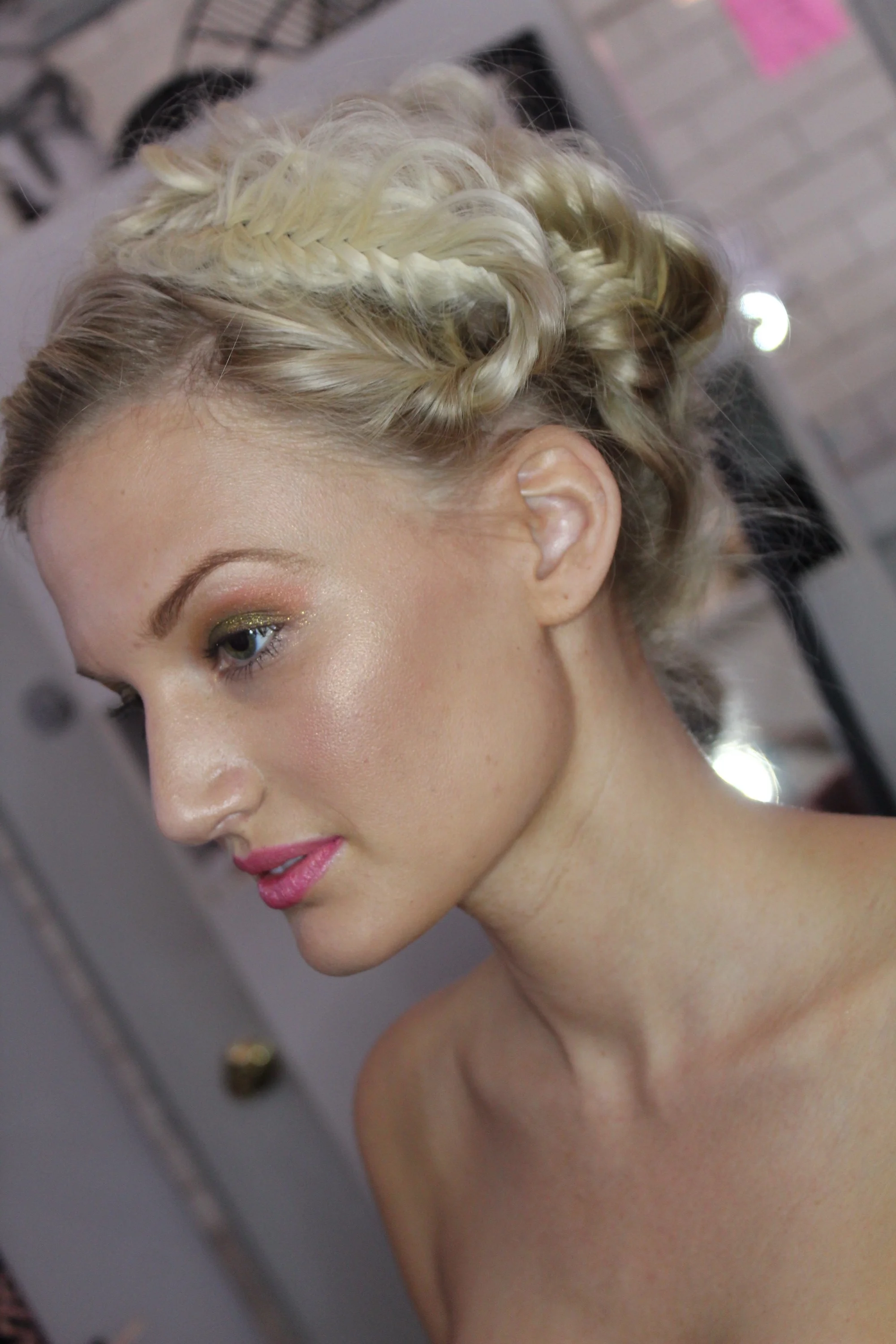 bts side view of Emily's updo