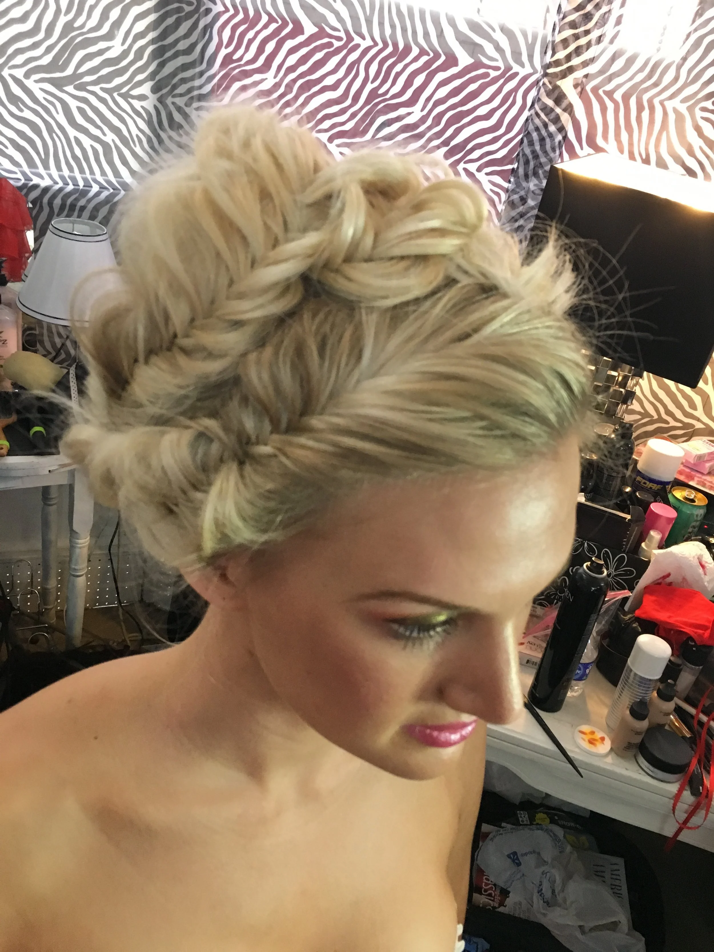 bts side view of Emily's updo