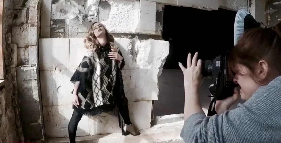 model Karoline, striking a pose on set