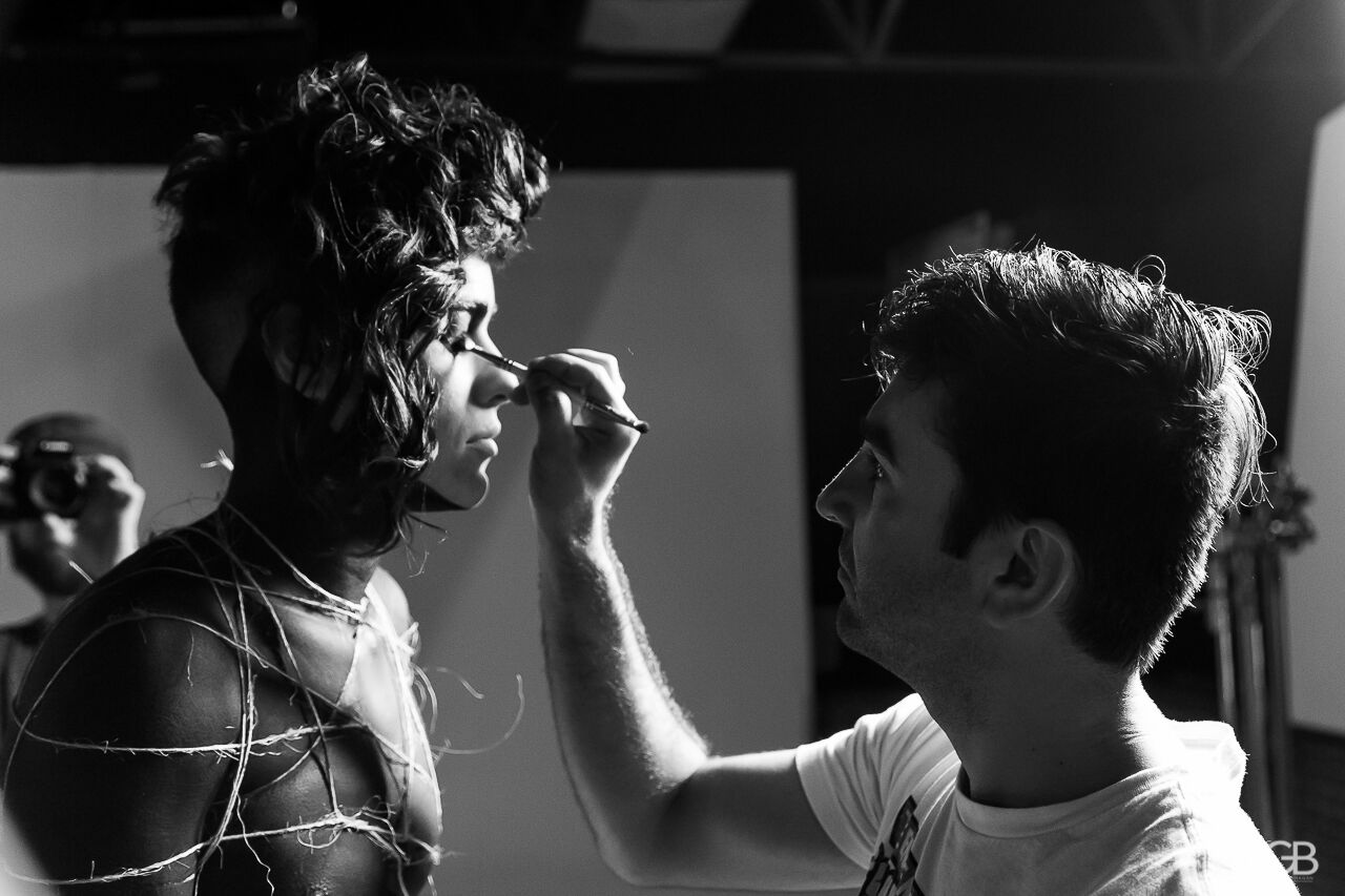 the make up master working on his canvas