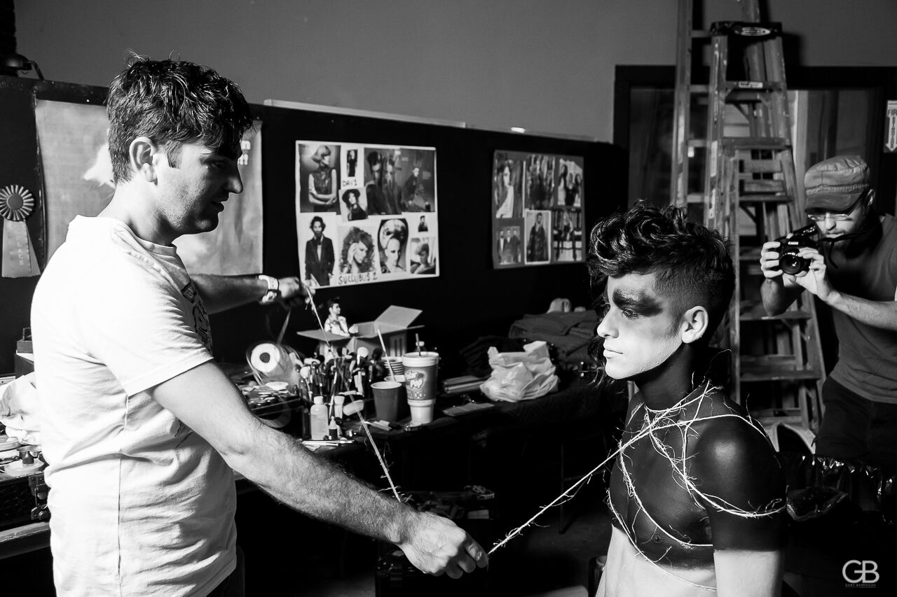 making up model, Chris with mua, Isidro